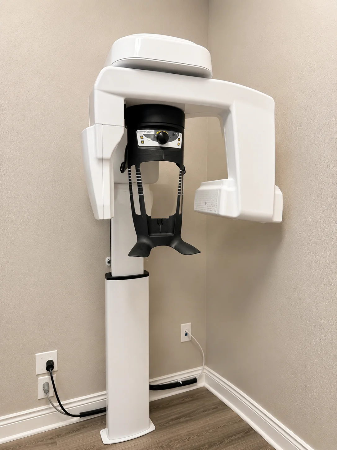 White dental imaging equipment in a dedicated corner of the New Dawn Dental office